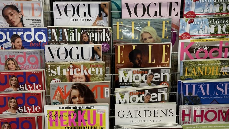 Magazine rack featuring Vogue, Elle, and other international fashion publications